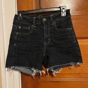 American Eagle size 4 women’s Dark Denim Cutoff Shorts raw hem super stretch